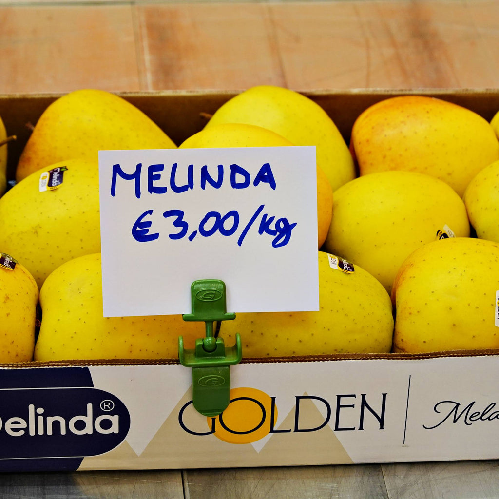 etichetta segnaprezzi montata su pinza portaprezzi negozio